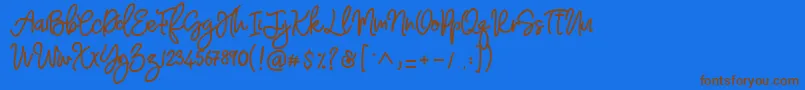 Adventure Dreamer Font – Brown Fonts on Blue Background
