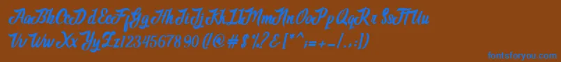 フォントAdventure Script – 茶色の背景に青い文字