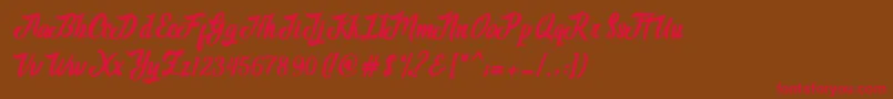 Adventure Script Font – Red Fonts on Brown Background