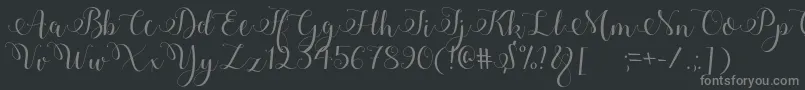 Adyana-Schriftart – Graue Schriften auf schwarzem Hintergrund