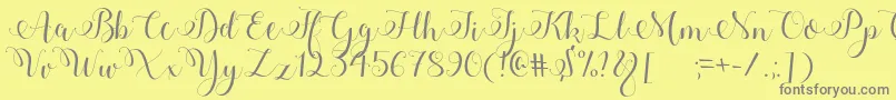 Adyana Font – Gray Fonts on Yellow Background