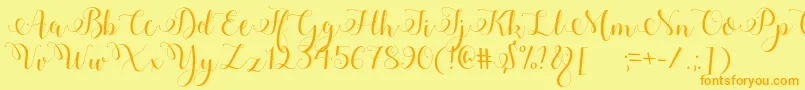 Adyana-Schriftart – Orangefarbene Schriften auf gelbem Hintergrund