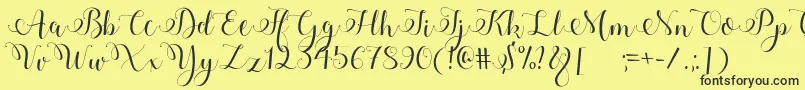Adyana Font – Black Fonts on Yellow Background