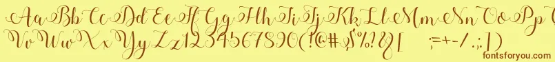 Adyana Font – Brown Fonts on Yellow Background
