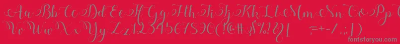 Adyana Font – Gray Fonts on Red Background