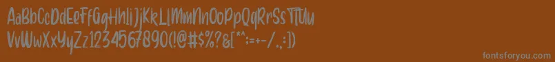 Aero brush demo Font – Gray Fonts on Brown Background