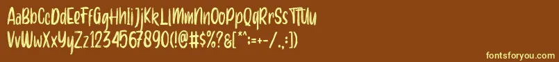 Aero brush demo-Schriftart – Gelbe Schriften auf braunem Hintergrund