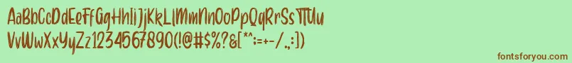 Aero brush demo Font – Brown Fonts on Green Background