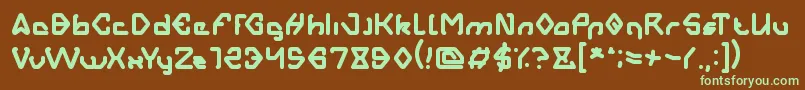 AERO DYNAMIC-fontti – vihreät fontit ruskealla taustalla