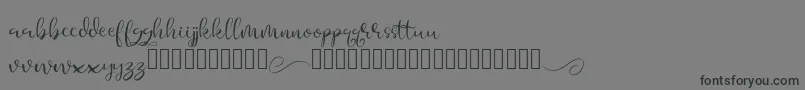 フォントAesteh – 黒い文字の灰色の背景