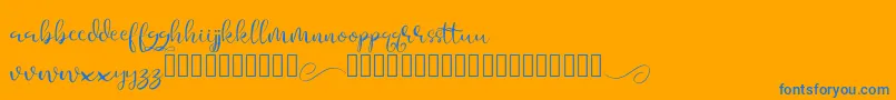 Aesteh-Schriftart – Blaue Schriften auf orangefarbenem Hintergrund