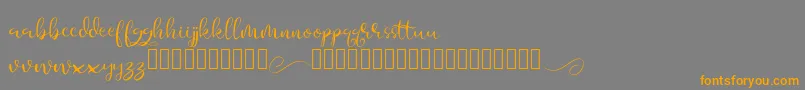 Aesteh-Schriftart – Orangefarbene Schriften auf grauem Hintergrund