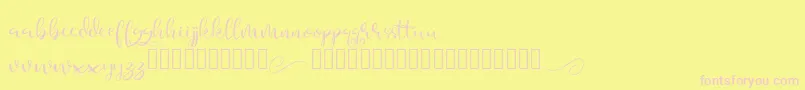 Aesteh-fontti – vaaleanpunaiset fontit keltaisella taustalla