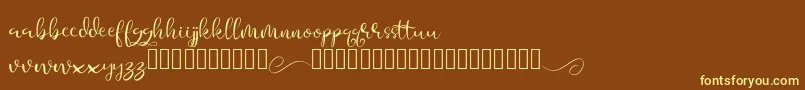 Aesteh-fontti – keltaiset fontit ruskealla taustalla