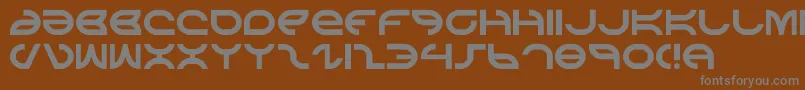 aetherfox-fontti – harmaat kirjasimet ruskealla taustalla