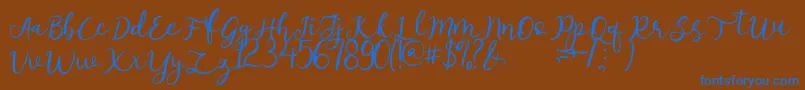 afnolyca Font – Blue Fonts on Brown Background