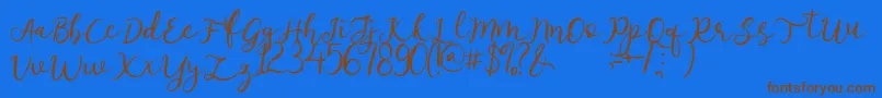 afnolyca Font – Brown Fonts on Blue Background