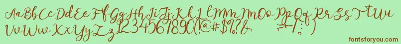 afnolyca Font – Brown Fonts on Green Background