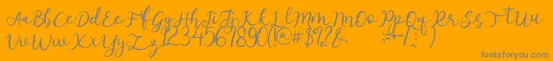 afnolyca-Schriftart – Graue Schriften auf orangefarbenem Hintergrund