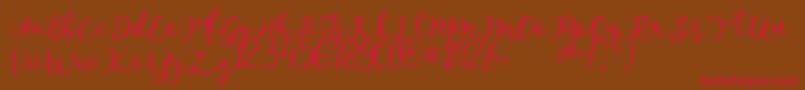 afnolyca-Schriftart – Rote Schriften auf braunem Hintergrund