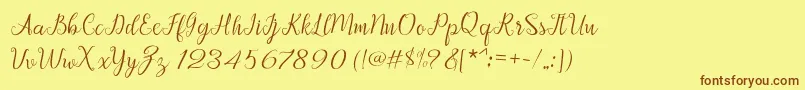 Afrile script Font – Brown Fonts on Yellow Background