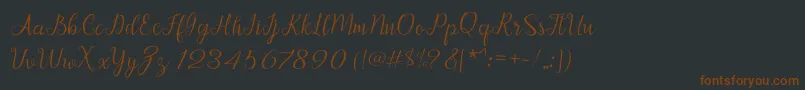Afrile script Font – Brown Fonts on Black Background