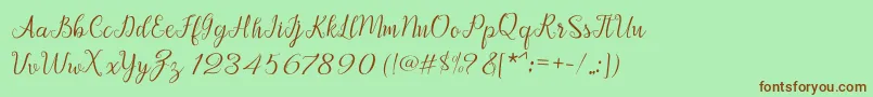 Afrile script Font – Brown Fonts on Green Background