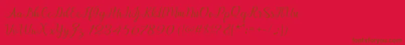 Afrile script-Schriftart – Braune Schriften auf rotem Hintergrund