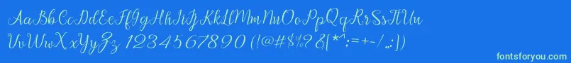Afrile script Font – Green Fonts on Blue Background