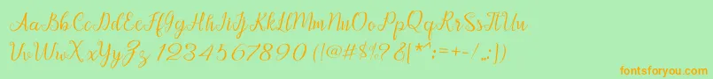 Afrile script Font – Orange Fonts on Green Background