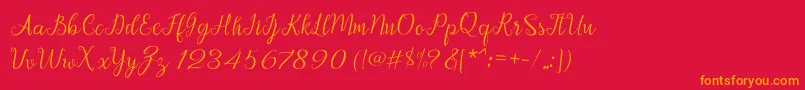 Afrile script Font – Orange Fonts on Red Background