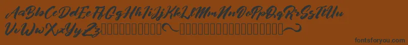 afrinuma Font – Black Fonts on Brown Background