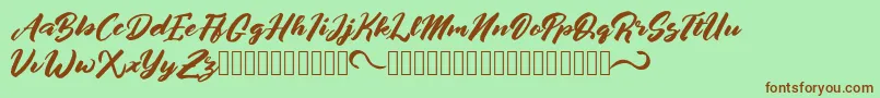 afrinuma Font – Brown Fonts on Green Background