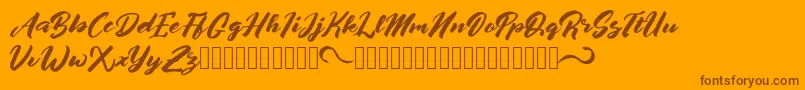 afrinuma-Schriftart – Braune Schriften auf orangefarbenem Hintergrund