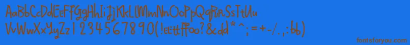 Qokijo Font – Brown Fonts on Blue Background