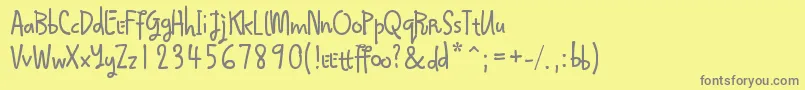 Qokijo Font – Gray Fonts on Yellow Background