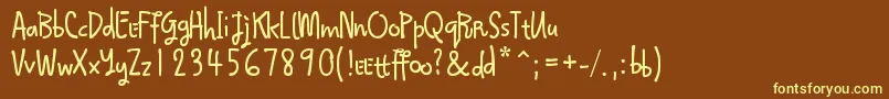 Qokijo-fontti – keltaiset fontit ruskealla taustalla