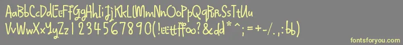 Qokijo Font – Yellow Fonts on Gray Background