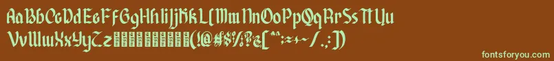 フォントAfterkilly – 緑色の文字が茶色の背景にあります。