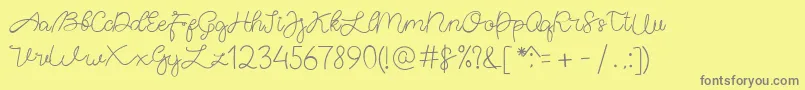 AgalattaScript Regular-Schriftart – Graue Schriften auf gelbem Hintergrund