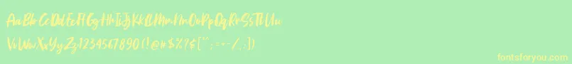 Aggitha Font – Yellow Fonts on Green Background