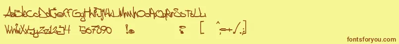 フォントaggstock – 茶色の文字が黄色の背景にあります。