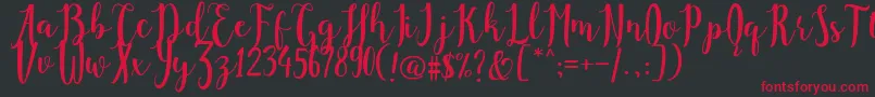 フォントAgustina Demo – 黒い背景に赤い文字