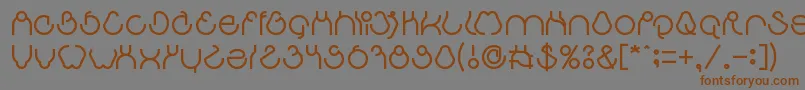 フォントaha experience – 茶色の文字が灰色の背景にあります。