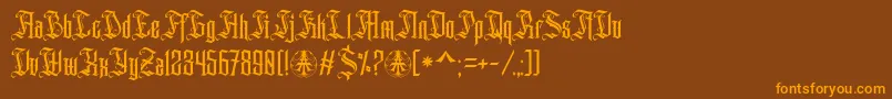 フォントAihet Script Personal Use Only – オレンジ色の文字が茶色の背景にあります。