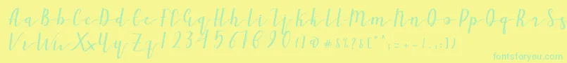 Ailand-Schriftart – Grüne Schriften auf gelbem Hintergrund