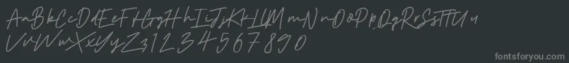 Aintonio-Schriftart – Graue Schriften auf schwarzem Hintergrund