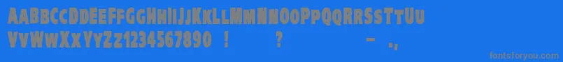 VtcKreepykomikaoneBold Font – Gray Fonts on Blue Background