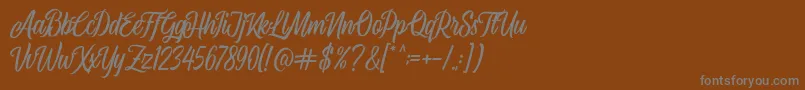 Airplane Script-Schriftart – Graue Schriften auf braunem Hintergrund