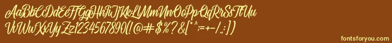 Airplane Script-fontti – keltaiset fontit ruskealla taustalla